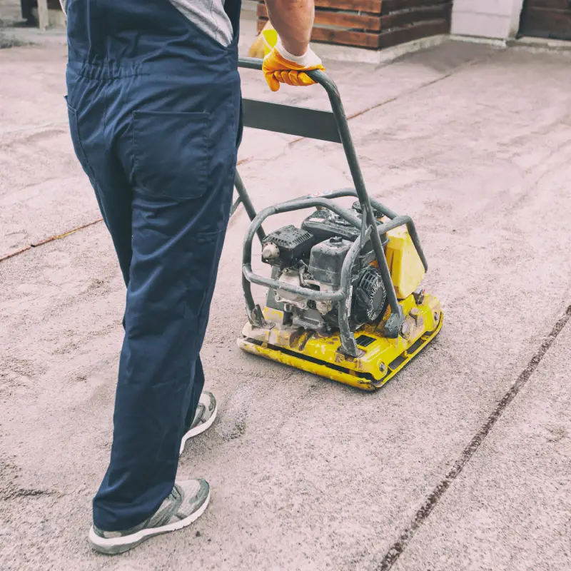 Driveway and Paving Services Woodbridge carrying out ground excavation and preparation work.