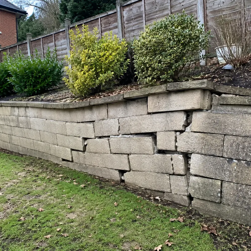 Garden Retaining Wall Installation for replacing a cracked or leaning garden wall.